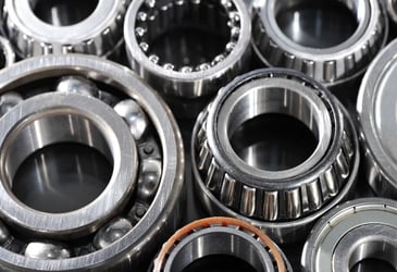 A image of different types of bearings taken by someone trying to decide which one is best.
